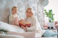 Mother little daughter reading book Royalty Free Stock Photo