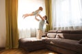 Mother and little daughter spend time together at home.