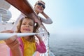 Mother and little daughter stand on board of ship Royalty Free Stock Photo