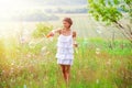 Mother and little girl daughter child blowing soap bubbles outdoor. Parent and kid having fun on meadow. Happy and Royalty Free Stock Photo