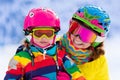 Mother and little girl learning to ski