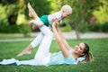 Mother and little son doing exercise outdoors. Healthy lifestyle. Yoga Royalty Free Stock Photo