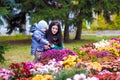 Mother with little son plays in autumn park Royalty Free Stock Photo