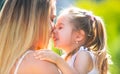 Mother love. Mother and child girl playing kissing and hugging. Little daughter hugging her happy mother. Royalty Free Stock Photo