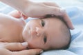 Mother loves and cares for her newborn baby Royalty Free Stock Photo