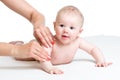 Mother massaging her baby Royalty Free Stock Photo