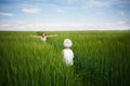 Mother meeting her baby in green field Royalty Free Stock Photo