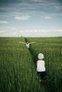 Mother meeting her daughter in spring green field Royalty Free Stock Photo