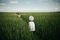 Mother meeting her daughter in spring green field Royalty Free Stock Photo