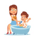 Daily mother. Mom bathes the child, mother helps boy take water treatments, washes with shampoo foam, kid every day