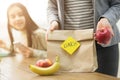 Mother Packing Healthy School Lunch For Daughter Royalty Free Stock Photo