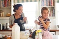 Mother, play or child baking in kitchen as a happy family with an excited girl learning cookies recipe. Cake, daughter Royalty Free Stock Photo