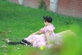 Mother play games with her little baby girl on the lawn Royalty Free Stock Photo