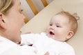 Mother Playing With Baby In Cot Royalty Free Stock Photo