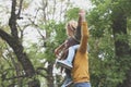 Mother playing with her daughter in city park. Royalty Free Stock Photo