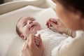 Mother Playing With Newborn Baby Lying On Changing Table Royalty Free Stock Photo