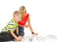 Mother playing puzzle together with her son Royalty Free Stock Photo
