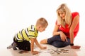 Mother playing puzzle toy with her son Royalty Free Stock Photo