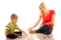 Mother playing puzzle toy with her son Royalty Free Stock Photo