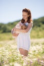 Mother posing with her baby