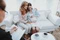 Mother with Pregnant Daughter in Doctor Office.