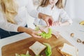 Mother preparing sandwich school lunch table close up Royalty Free Stock Photo