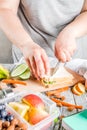 Mother preparing school lunch box Royalty Free Stock Photo