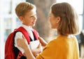 Mother preparing son for school studies Royalty Free Stock Photo