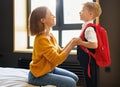 Mother preparing son for school studies Royalty Free Stock Photo