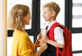 Mother preparing son for school studies Royalty Free Stock Photo