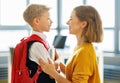 Mother preparing son for school studies Royalty Free Stock Photo