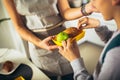 Mother preparing sons school lunch in the kitchen Royalty Free Stock Photo