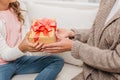 Mother presenting gift to daughter Royalty Free Stock Photo