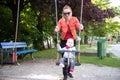 Mother Pushing Baby Boy Having Fun on Swing Royalty Free Stock Photo