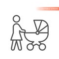 Mother pushing baby stroller or pram