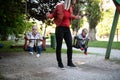 Mother Pushing Her Baby`s Having Fun on Swing Royalty Free Stock Photo