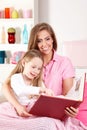 Mother reading book with child Royalty Free Stock Photo