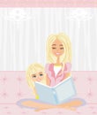 A mother reading a book with her daughter Royalty Free Stock Photo