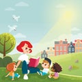 Mother reading a book for kids sitting on medow, lawn outskirts of the city Royalty Free Stock Photo