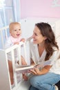 Mother reading book to baby Royalty Free Stock Photo