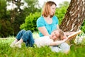 Mother reading book to her daughter Royalty Free Stock Photo