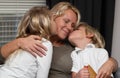 Mother reading to children