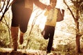 Mother running trough park with her daughter an Royalty Free Stock Photo