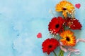 Mother`s Day background or greeting card. Bouquet Flowers of gerbera on a stone background