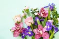 Mother`s day or birthday background. Spring beautiful bouquet of blooming rose, orchids, carnations and irises and spring greener Royalty Free Stock Photo