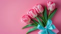 Mother's Day decorations concept. Top view photo of trendy gift boxes with ribbon bows and tulips on isolated pastel Royalty Free Stock Photo