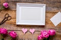 Mother`s day gift with peony flowers and frame top view mockup Royalty Free Stock Photo