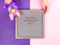 Mother`s day greetings on letter board and tulips Royalty Free Stock Photo