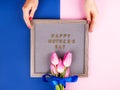 Mother`s day greetings on letter board and tulips Royalty Free Stock Photo