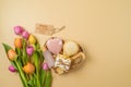 Mother\'s day heart shape gift box with eco friendly home self care products and tulip flowers on beige background. Royalty Free Stock Photo